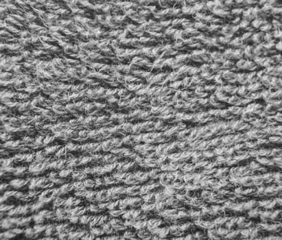Blue fluffy cloth close view. Black and white monochrome grayscale photo background.