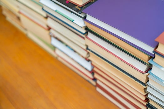 Rows of books in the library. Background for text. Symbol of knowledge and learning. photo