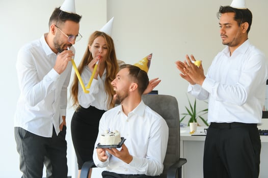 corporate party and people concept - happy team with cake celebrating colleague birthday at office photo