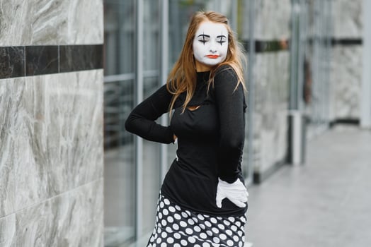 The girl with makeup of the mime. improvisation. photo