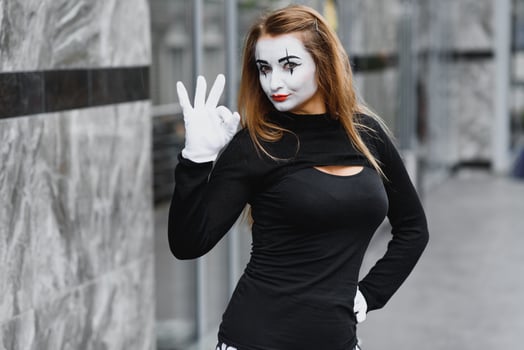 The girl with makeup of the mime. improvisation. mime shows different emotions photo