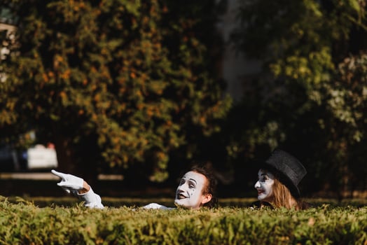 Street artists performing, Two mimes man and woman in april fools day photo