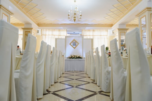 an image of tables setting at a luxury wedding hall photo