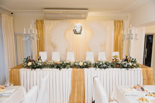an image of tables setting at a luxury wedding hall photo