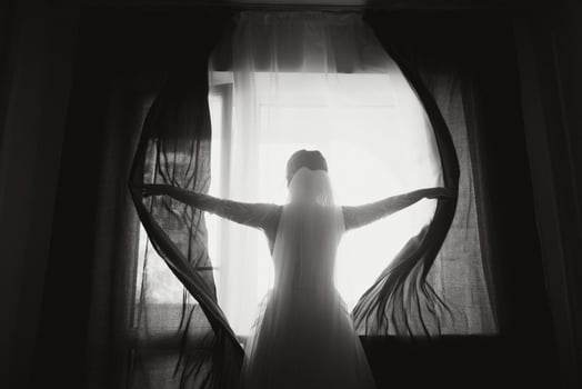 Bride dressing wedding gown. morning bride. photo