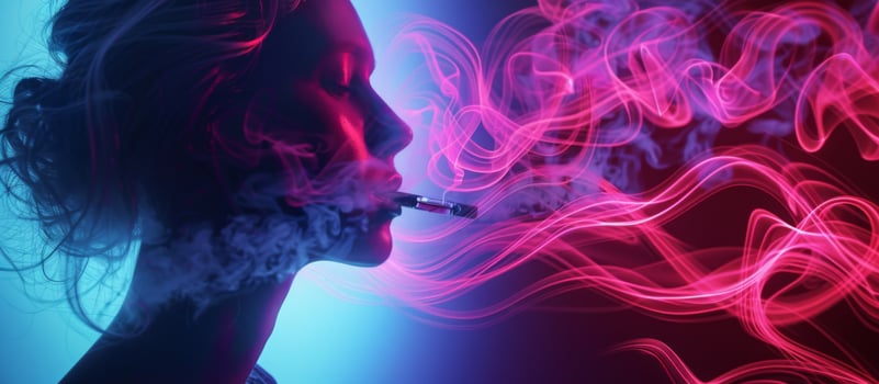 A woman is smoking a cigarette and the smoke is pink photo