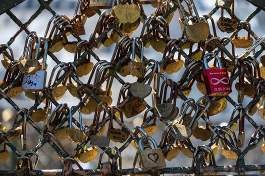 padlock stuck in metal fence photo