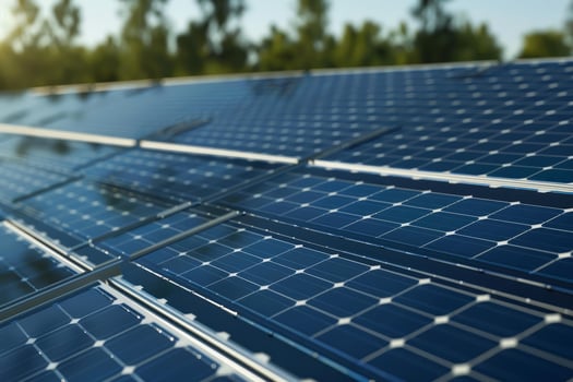 Sleek solar panel array against clear sky photo