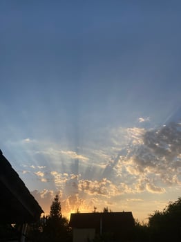 Clouds at sunset on a hot summer day photo