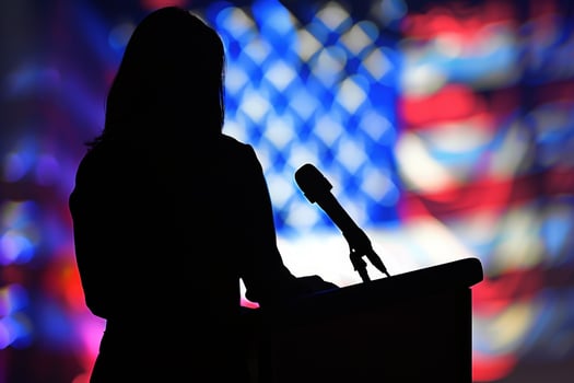Silhouette of a person at a podium with USA flag background. photo