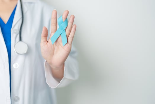 Blue November Prostate Cancer Awareness month, Doctor with Blue Ribbon in hospital for support people life and illness. Healthcare, International men, Father, Diabetes and World cancer day photo