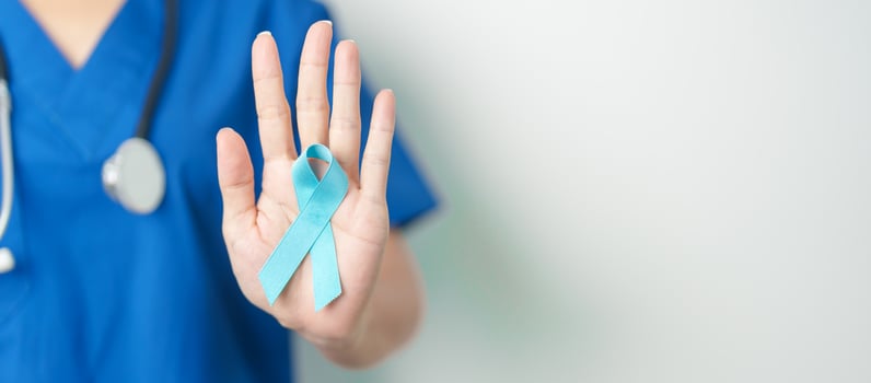 Blue November Prostate Cancer Awareness month, Doctor with Blue Ribbon in hospital for support people life and illness. Healthcare, International men, Father, Diabetes and World cancer day photo