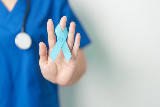 Blue November Prostate Cancer Awareness month, Doctor with Blue Ribbon in hospital for support people life and illness. Healthcare, International men, Father, Diabetes and World cancer day photo