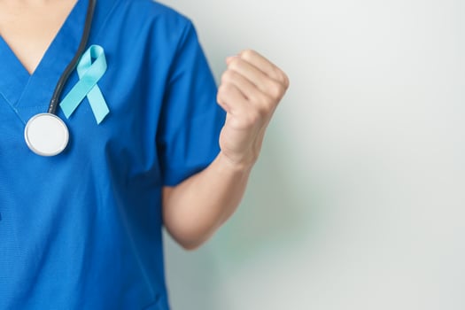 Blue November Prostate Cancer Awareness month, Doctor with Blue Ribbon in hospital for support people life and illness. Healthcare, International men, Father, Diabetes and World cancer day photo