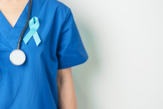 Blue November Prostate Cancer Awareness month, Doctor with Blue Ribbon in hospital for support people life and illness. Healthcare, International men, Father, Diabetes and World cancer day photo