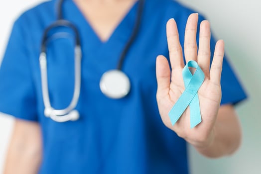 Blue November Prostate Cancer Awareness month, Doctor with Blue Ribbon in hospital for support people life and illness. Healthcare, International men, Father, Diabetes and World cancer day photo