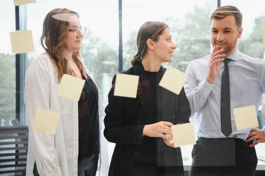 Corporate business team and in a meeting at modern office with big windows . High quality photo