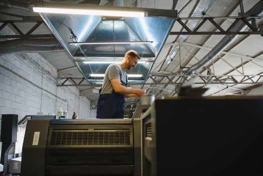 Factory worker. Man working on the production line. photo