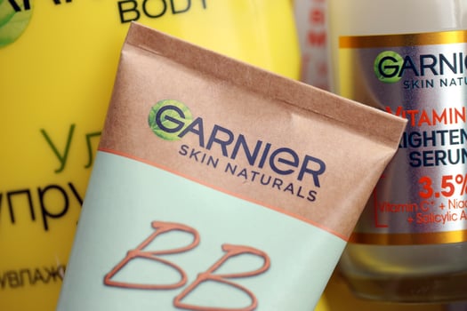 KYIV, UKRAINE - APRIL 20, 2024 Garnier production with company logo. Garnier is a mass market cosmetics brand of French cosmetics company L'Oreal photo