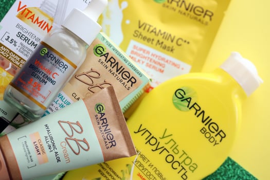 KYIV, UKRAINE - APRIL 20, 2024 Garnier production with company logo. Garnier is a mass market cosmetics brand of French cosmetics company L'Oreal photo