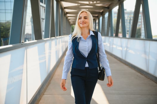 Business Women Style. Woman Going To Work. Portrait Of Beautiful Female In Stylish Office. photo