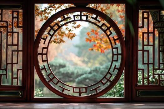 Traditional circular chinese window framing vibrant autumn colors in a serene garden setting photo