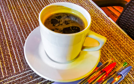 Cup of americano black coffee in restaurant cafe in Mexico. photo
