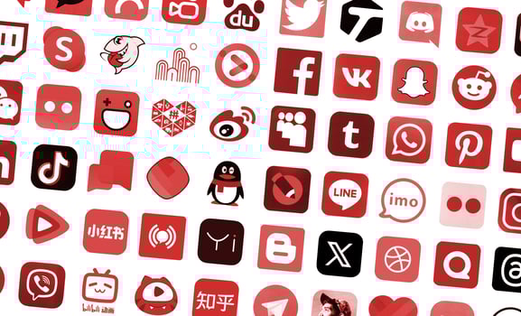KYIV, UKRAINE - APRIL 1, 2024 Many icons of social media, messengers, sharing platforms photo