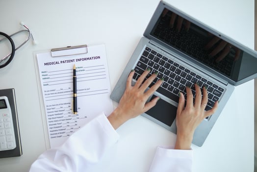 Doctors who act as medical consultants review customer information when they detect chronic illnesses in order to give advice on prescribing medication to treat symptoms correctly. medical consultant photo