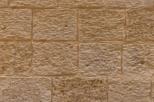 Frontal view of an orange wall with a vintage look photo