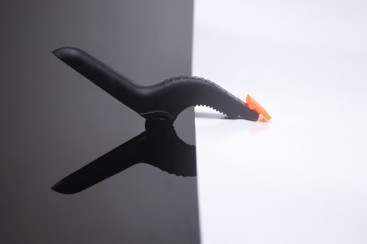 Photo of a clamp clamping on a white background