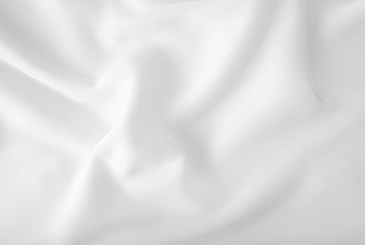 Clean White Folded Linens, Textured Fabric Background photo