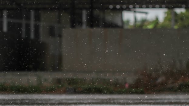 The rain was falling on the roadway due to a precipitation that was forming after the depression hit Thailand, causing heavy rains in some areas and flooding the road surface. photo