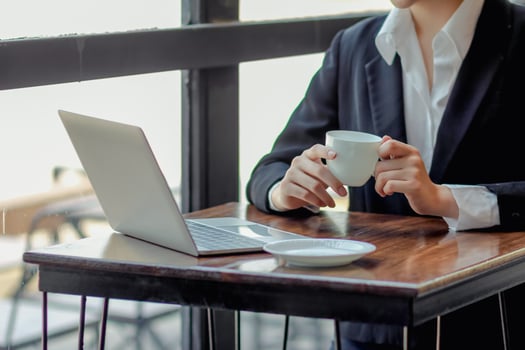 A young self-employed businesswoman and real estate investor, working in a home office and shopping online via the website. photo