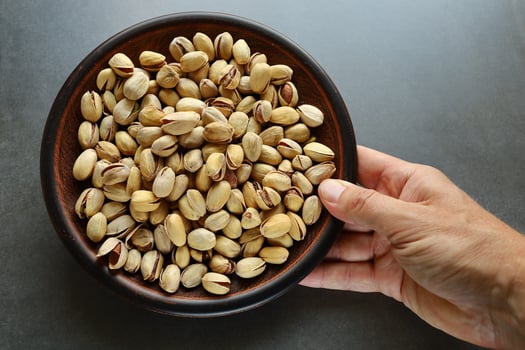 Pistachio nuts. Pistachios in a plate. photo