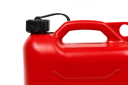 Red plastic canister for fuel isolate photo