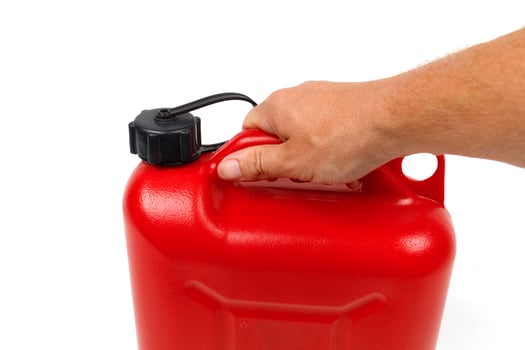 Red plastic canister for fuel isolate photo