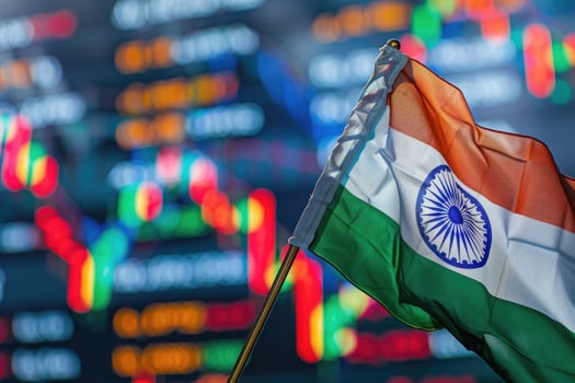 Indian flag waving with stock market graphs in background photo