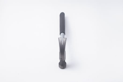 Close Up Photo of a hammer seen from above is on an isolated white background