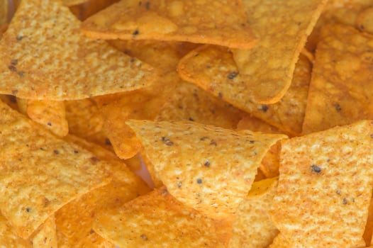 Background of Corn Tortilla Chips or Nachos photo