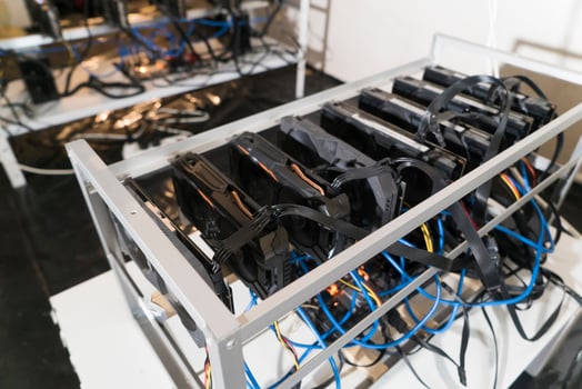 Virtual cryptocurrency concept. Farm for mining cryptocurrency on cards. Crypto farm. photo