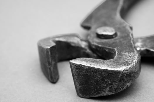 Tools for pulling nails - old metal pliers. photo