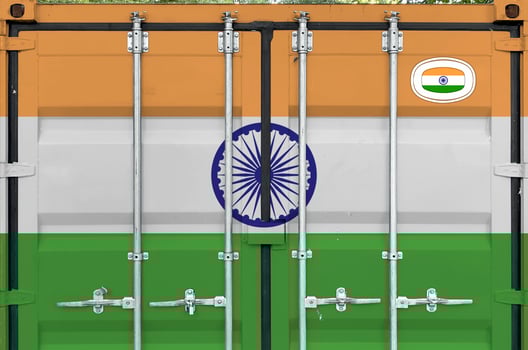 India flag depicted on metal doors of shipping cargo container outdoors in docks area photo