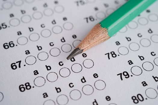 Answer sheets with pencil drawing fill to select choice, education concept. photo