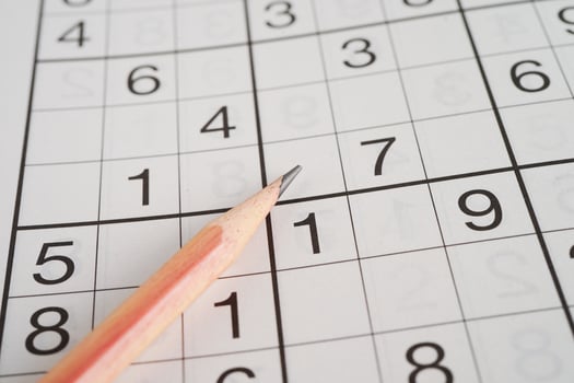 Sudoku puzzle, game to play for keep you brain younger for developing Alzheimer disease in senior patient. photo