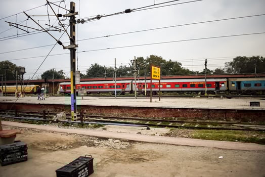 View of train Railway Tracks from the middle during daytime at Kathgodam railway station in India, Train railway track view, Indian Railway junction, Heavy industry photo