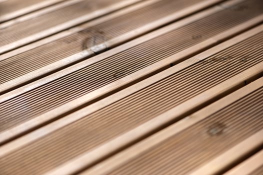 Wooden planks deck close-up perspective, natural background photo