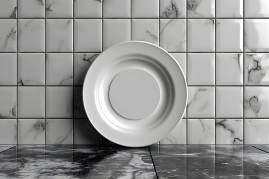 Minimalist White Plate on Marble Surface and Tile Background for Modern Kitchen Design photo