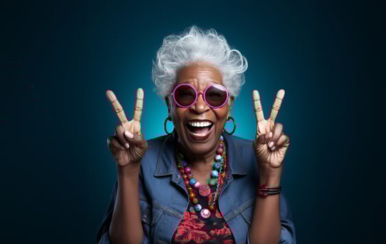 An elderly, modern African American woman with stylish grey hair is captured against a dark background, exuding joy and energy as she gracefully simulates aspects of contemporary senior photo