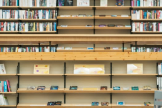 blurred background - bookshelves in the library photo
